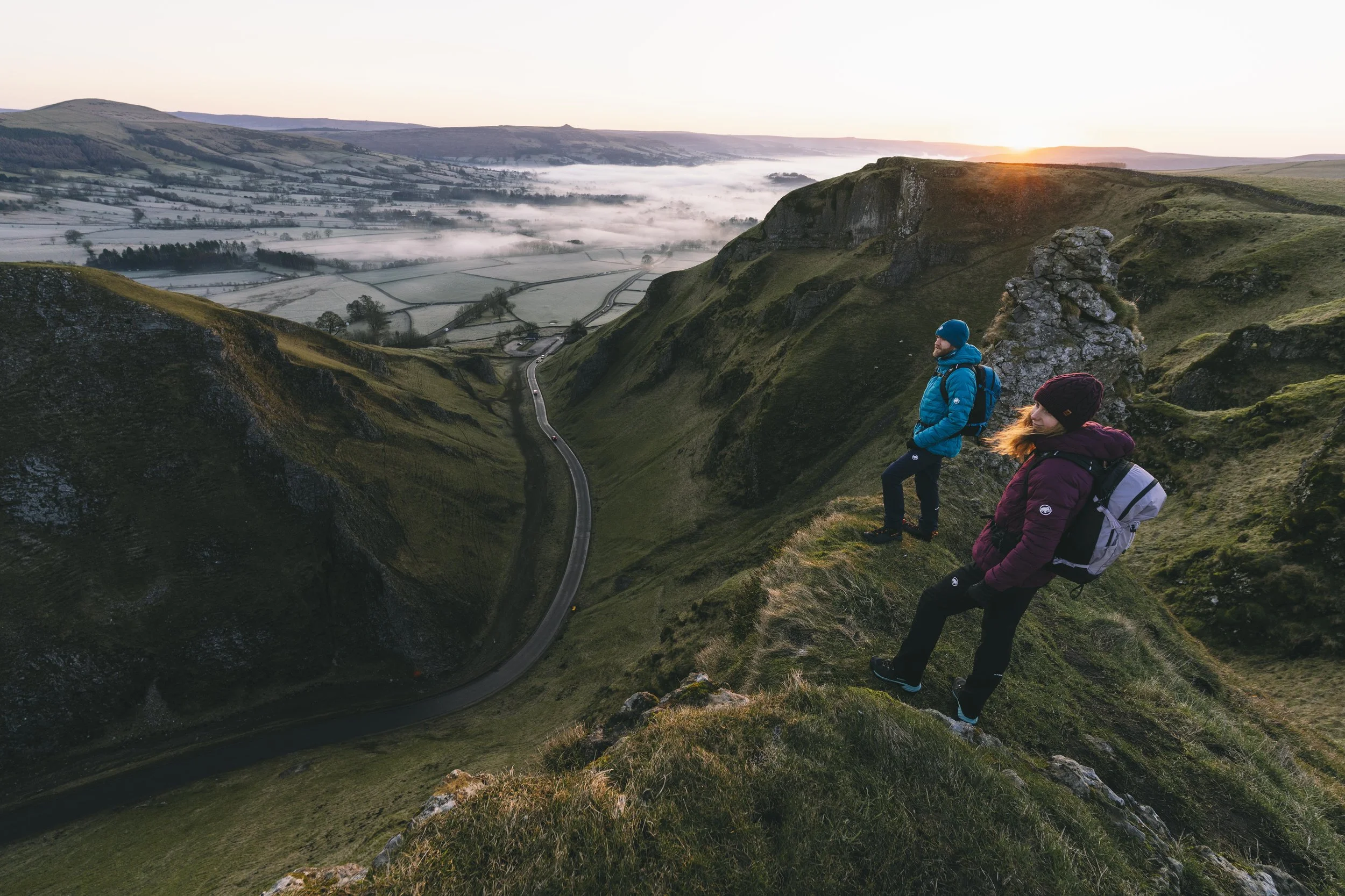 Walkers on a gritstone edge in the Peak District